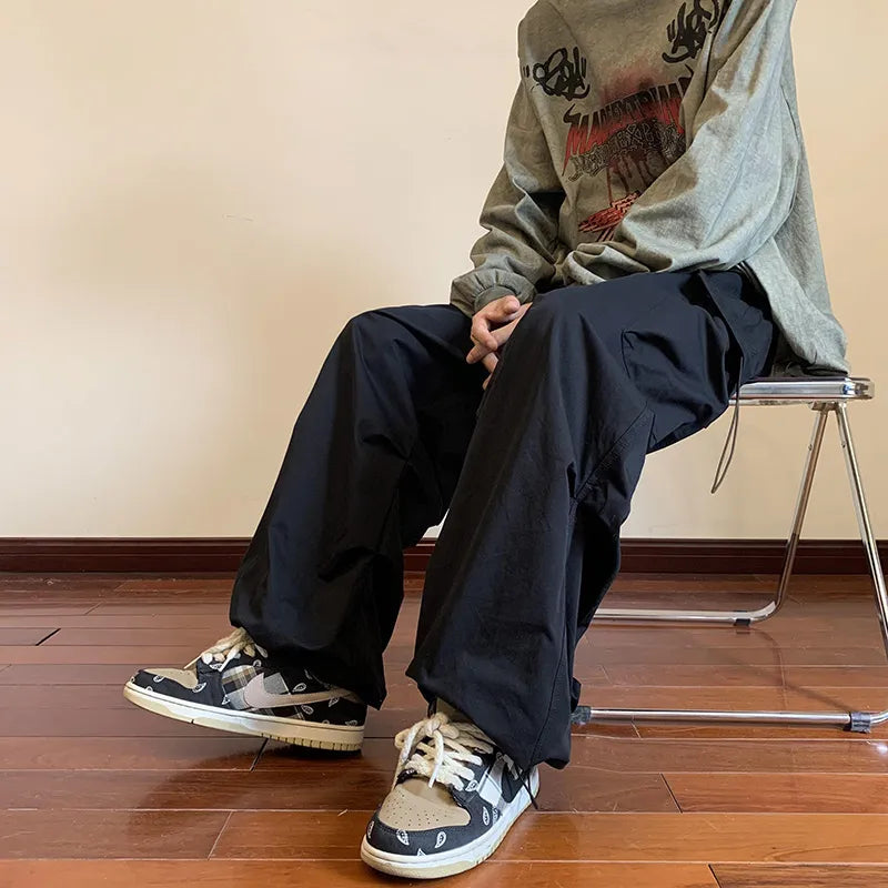 Spring 2023 Streetwear Harem Casual Pants with Elastic Waist and Multi Pocket Design